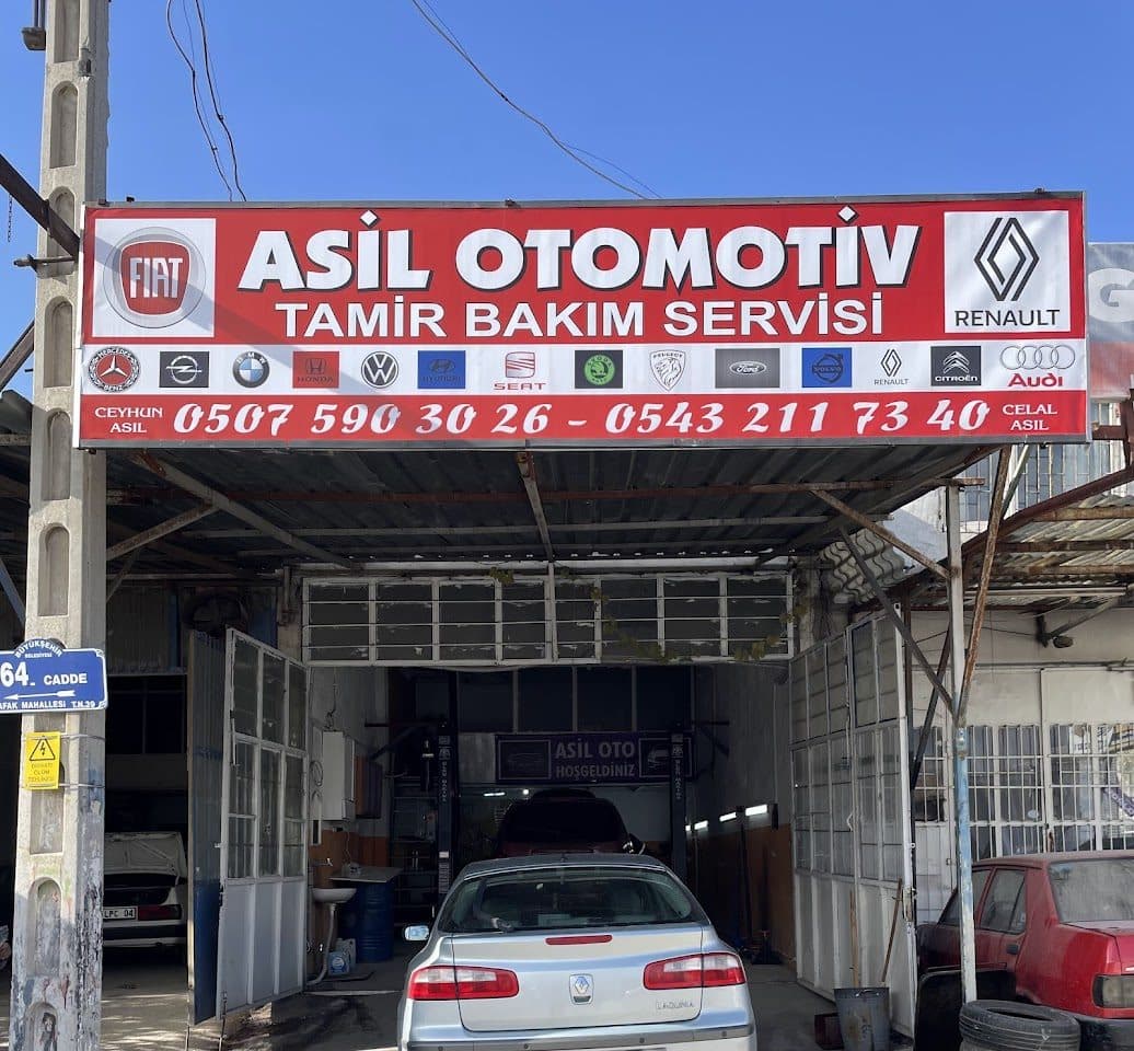 Asil Otomotiv tabelası ve dükkân girişi — Tamir Bakım Servisi