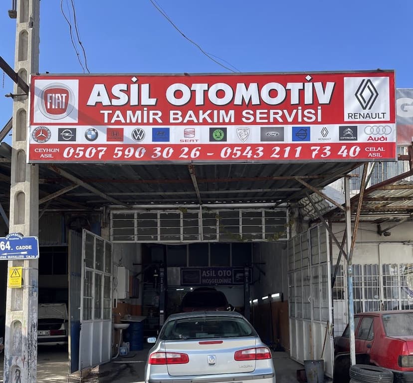Asil Otomotiv tabelası ve dükkân girişi — Tamir Bakım Servisi
