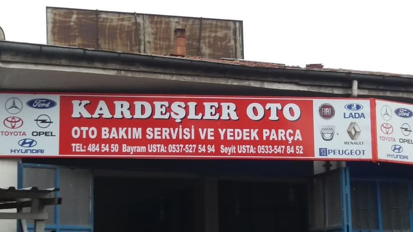 Kardeşler Oto — Oto Bakım Servisi ve Yedek Parça tabelası