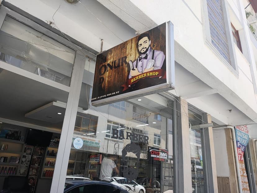 Moda Onur Berber Shop tabelası