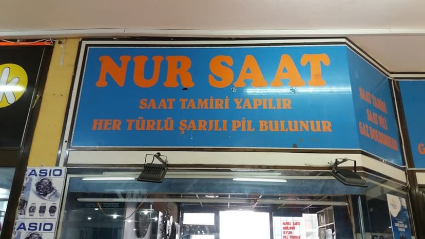 Nur Saat dükkân vitrini — Gölbaşı Ticaret Merkezi
