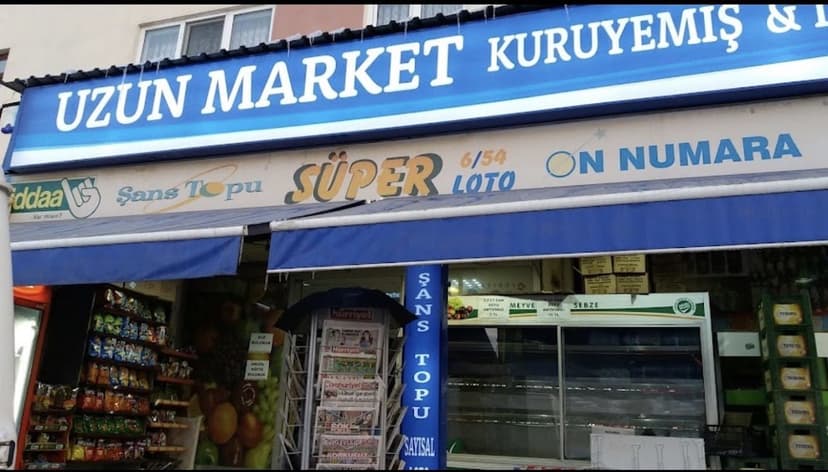 Uzun Market kuruyemiş ve şans oyunları cephesi