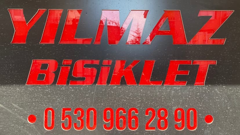 Yılmaz Bisiklet tabelası