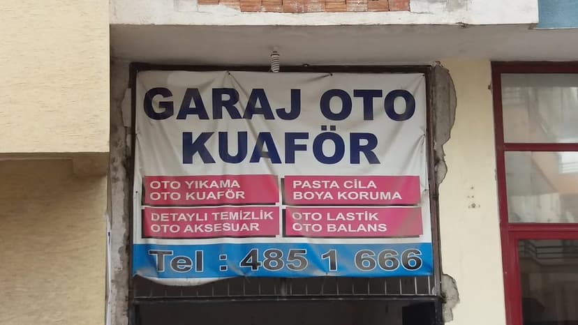 Garaj Oto Kuaför dükkân tabelası — oto yıkama, pasta cila, detaylı temizlik
